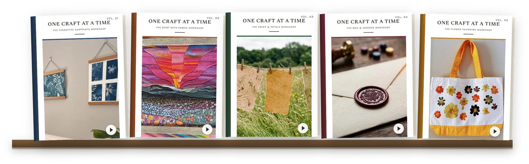 Five One Craft at a Time workshop volumes standing on a wooden shelf, one per craft, each cover with a play button